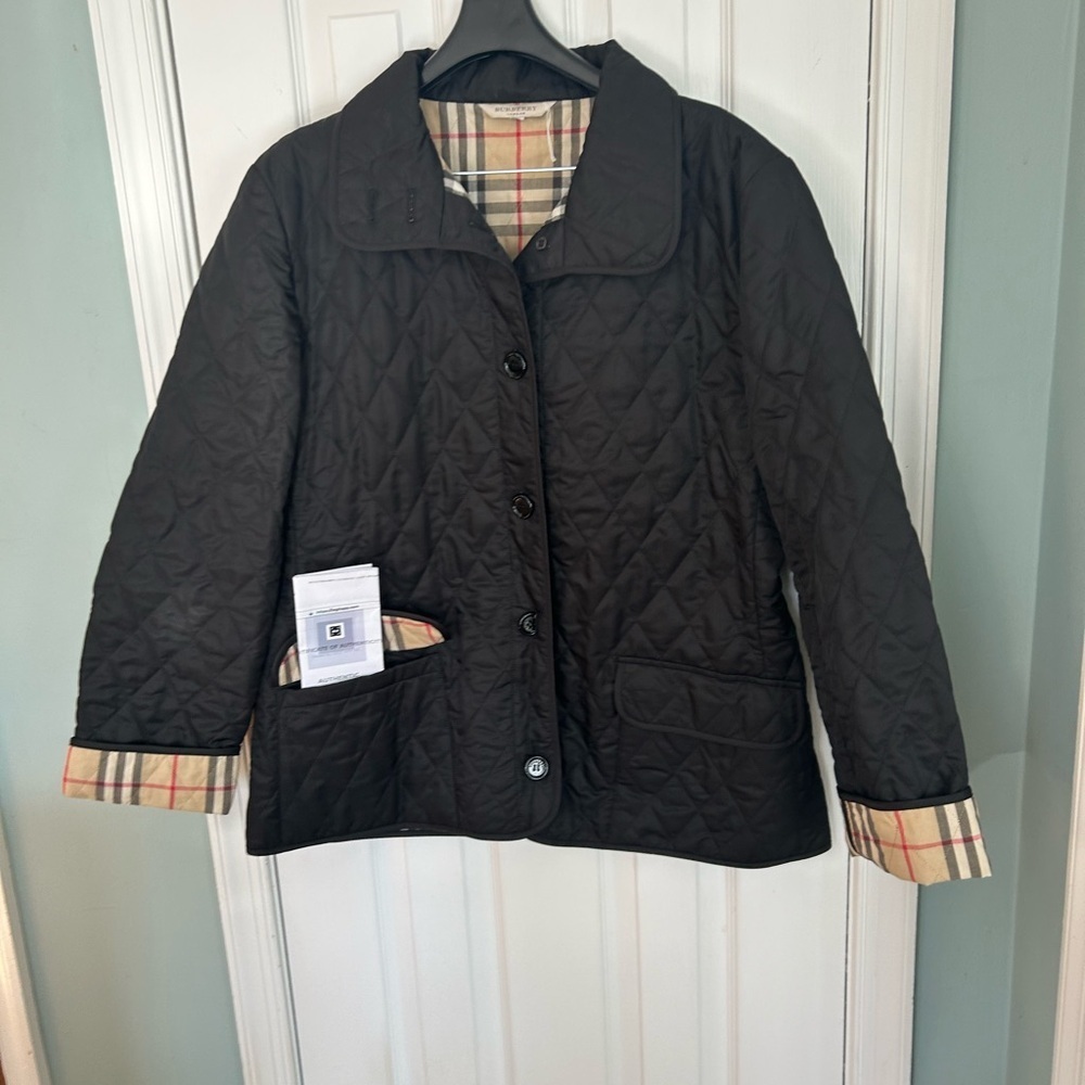 BURBERRY
Quilted shell jacket with COA